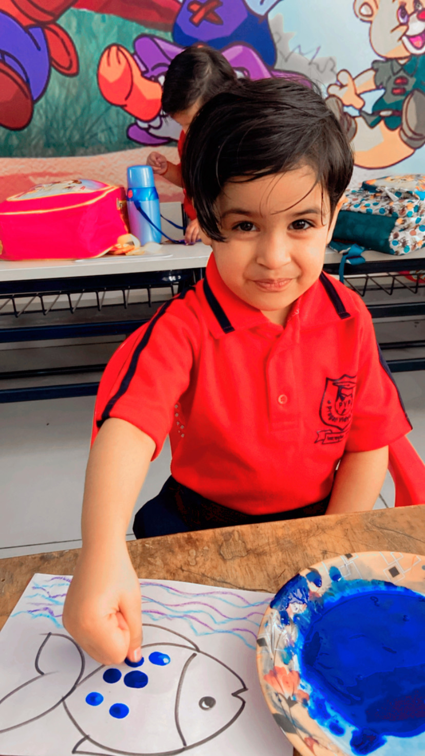 Thumb painting fun By NURSERY STUDENTS
